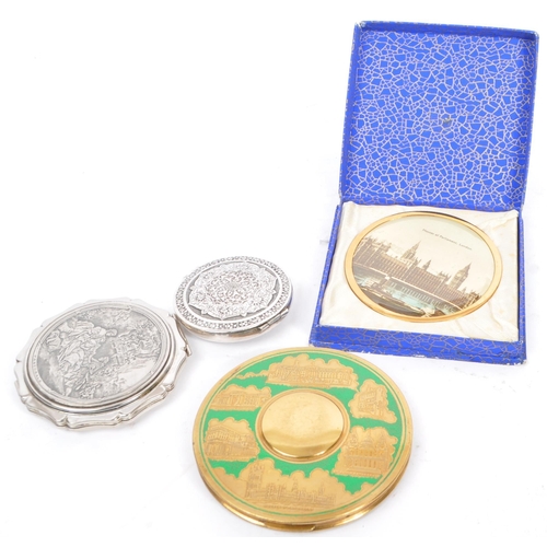 380 - A collection of vintage 20th century vanity compacts to include example in presentation box with an ... 