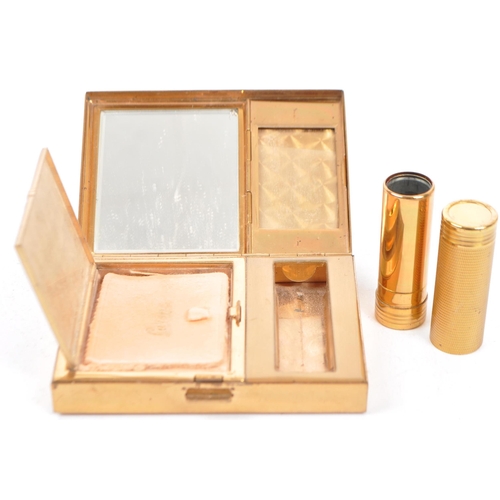 381 - A Vintage Patrys Limoges Lipstick holder and Agme compact. The Swiss made compact having a gold tone... 