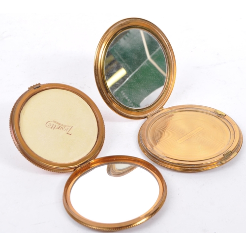 384 - A collection of vintage 20th century vanity compacts. to include a vintage dual cigarette and compac... 