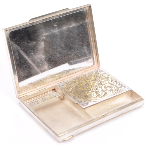 384 - A collection of vintage 20th century vanity compacts. to include a vintage dual cigarette and compac... 