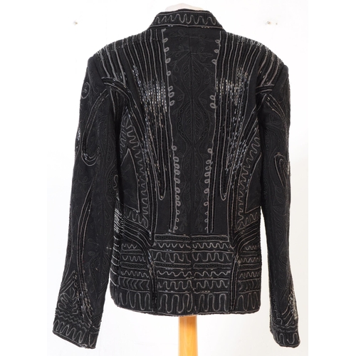 387 - A Bolongaro Trevor utility hand beaded jacket. The black blazer being made of 100% wool with 100% co... 