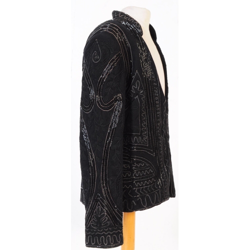 387 - A Bolongaro Trevor utility hand beaded jacket. The black blazer being made of 100% wool with 100% co... 