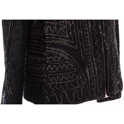 387 - A Bolongaro Trevor utility hand beaded jacket. The black blazer being made of 100% wool with 100% co... 