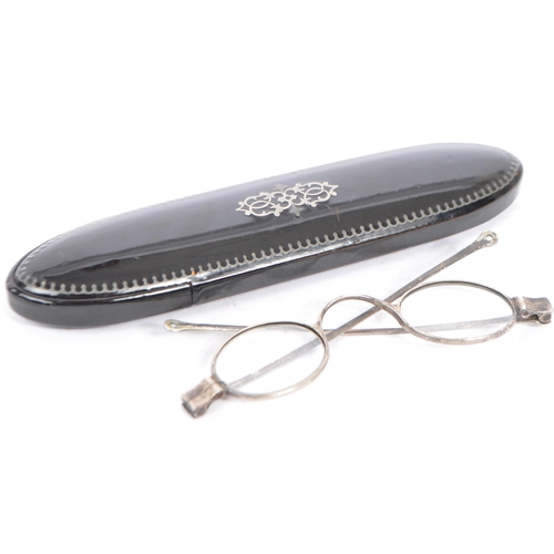 388 - A collection of early 20th century and vintage eyewear. To include a cased antique Lorgnette and pai... 