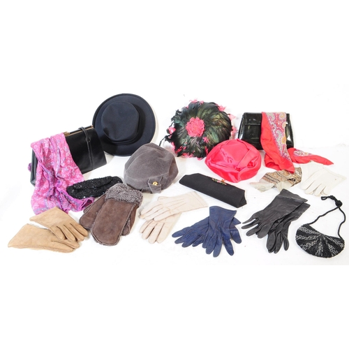 390 - A collection of vintage 20th century ladies fashion pieces to include hats, gloves, scarves, bags. T... 