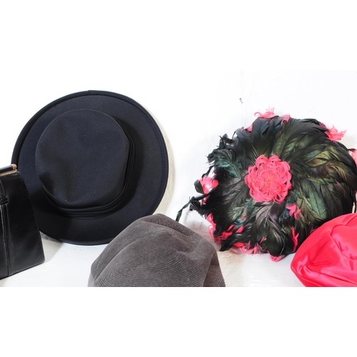 390 - A collection of vintage 20th century ladies fashion pieces to include hats, gloves, scarves, bags. T... 