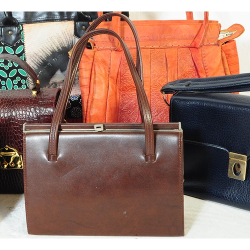 392 - A collection of 20th century vintage handbags. To include A collection of three vintage handbags a 1... 