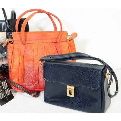 392 - A collection of 20th century vintage handbags. To include A collection of three vintage handbags a 1... 