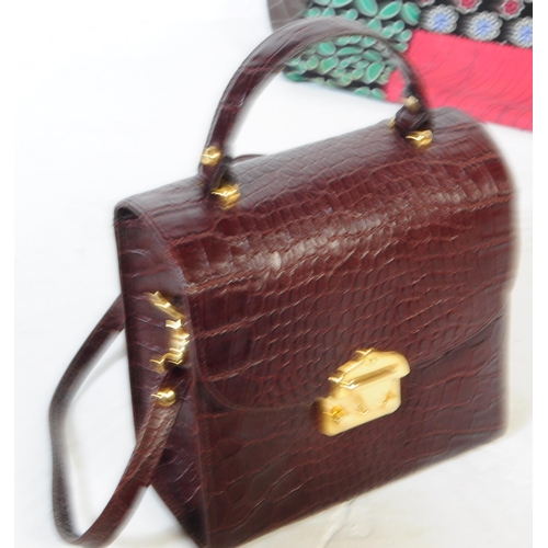 392 - A collection of 20th century vintage handbags. To include A collection of three vintage handbags a 1... 