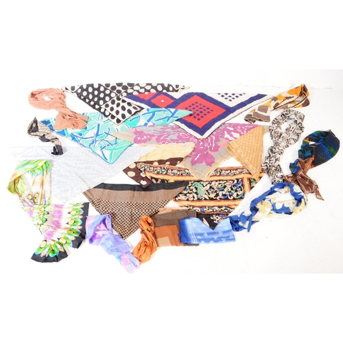 394 - A collection of vintage scarves and a handkerchief. The lot to include a hand rolled and stitched we... 