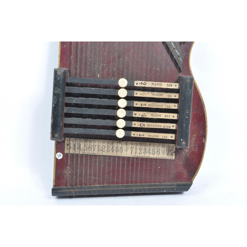 400a - Musical Instruments: An early 20th century Artist's Autoharp. The wooden body with strings and origi... 