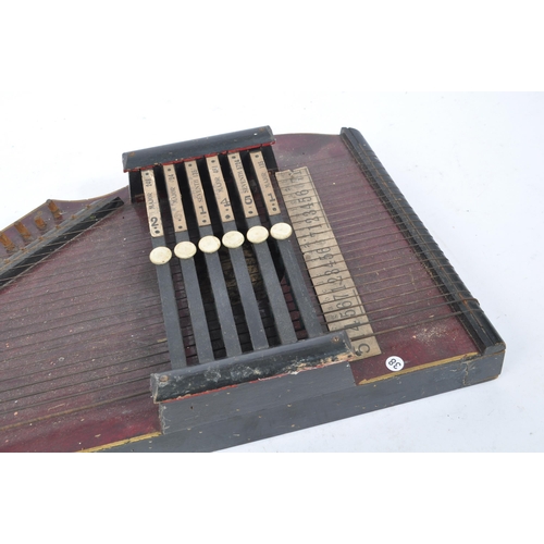 400a - Musical Instruments: An early 20th century Artist's Autoharp. The wooden body with strings and origi... 