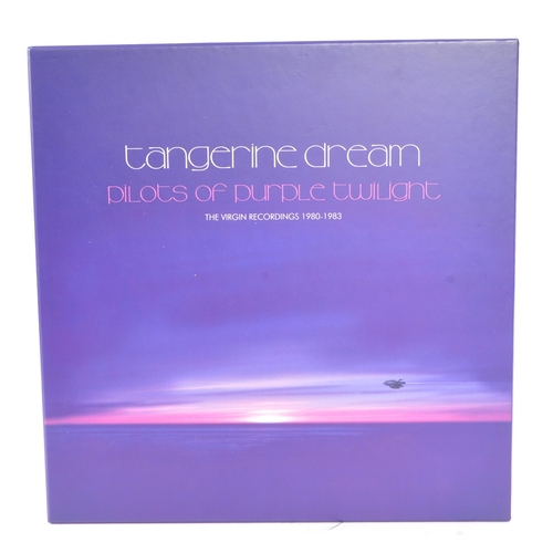 406 - Tangerine Dream - A collectible contemporary ten compact disc box set albums titled 'Pilots of Purpl... 