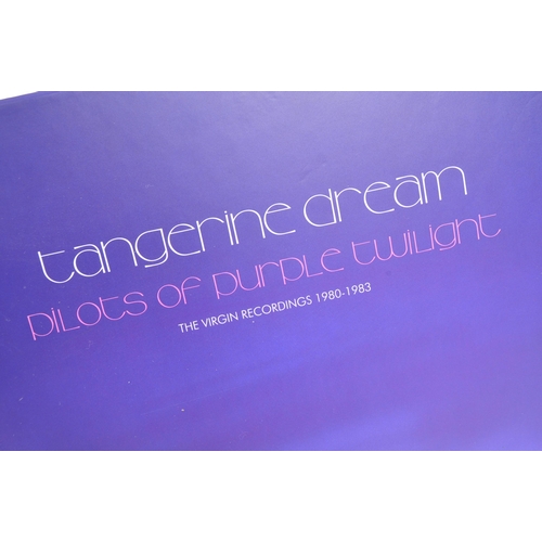 406 - Tangerine Dream - A collectible contemporary ten compact disc box set albums titled 'Pilots of Purpl... 