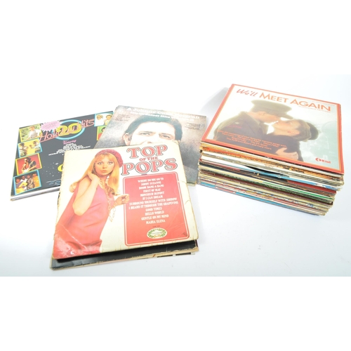 409 - A large collection of vintage 20th century LP long play vinyl records. Featuring compilation albums,... 