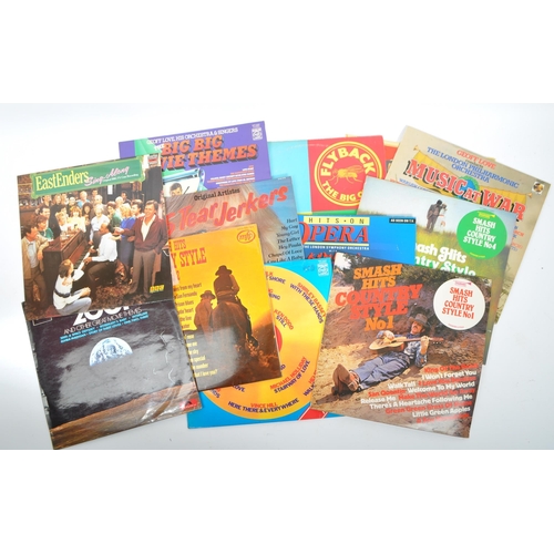 409 - A large collection of vintage 20th century LP long play vinyl records. Featuring compilation albums,... 