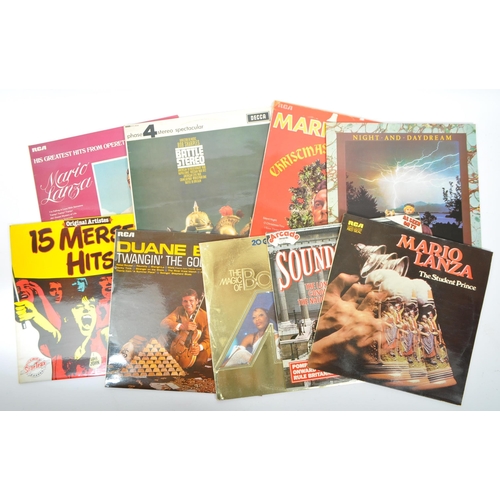 409 - A large collection of vintage 20th century LP long play vinyl records. Featuring compilation albums,... 