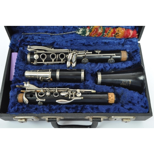 410 - A 20th century Boosey and Hawkes regent clarinet instrument. The clarinet having nickel fittings. In... 