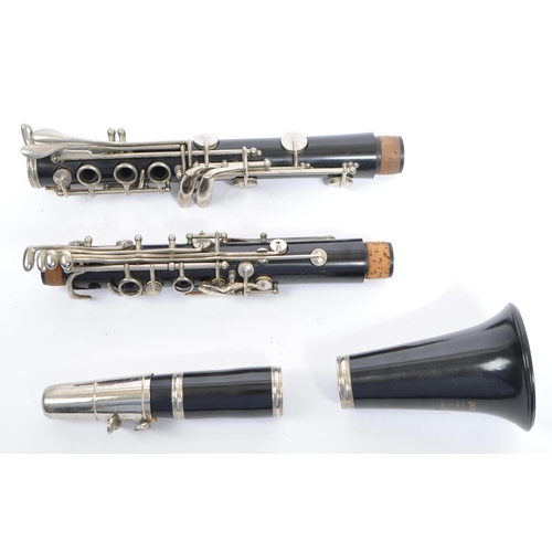 410 - A 20th century Boosey and Hawkes regent clarinet instrument. The clarinet having nickel fittings. In... 