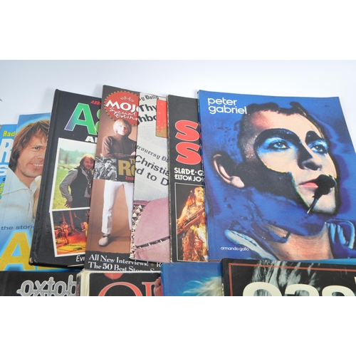 411 - A collection of music memorabilia to include books, DVD's, CD's, VHS Video & magazines; To include '... 