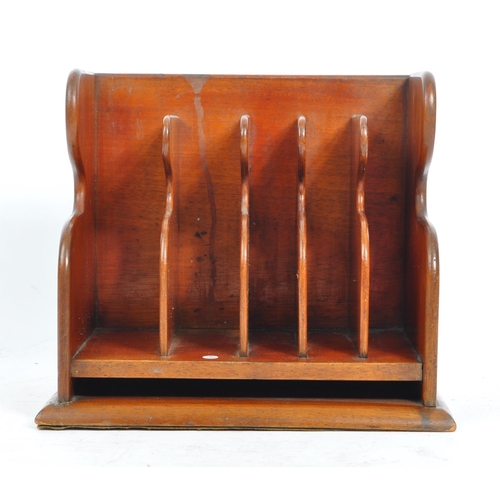 420a - An early 20th century mahogany wood letter rack. Of rectangular form, with mahogany wooden frame par... 