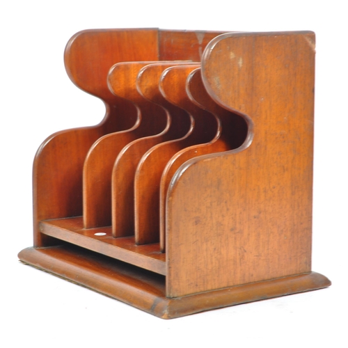 420a - An early 20th century mahogany wood letter rack. Of rectangular form, with mahogany wooden frame par... 