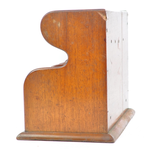 420a - An early 20th century mahogany wood letter rack. Of rectangular form, with mahogany wooden frame par... 