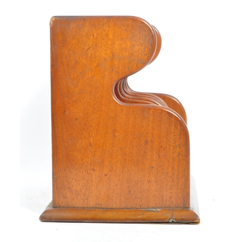 420a - An early 20th century mahogany wood letter rack. Of rectangular form, with mahogany wooden frame par... 
