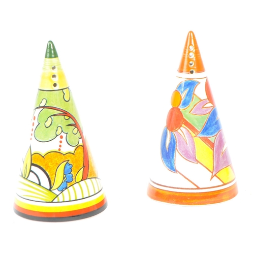 43 - Clarice Cliff - A pair of hand painted sugar sifters by Clarice Cliff. Includes 'Cornwall', the othe... 