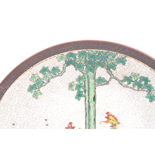 45a - A 19th century large Chinese crackle glaze wall charger - plate. The stone glazed border with floral... 