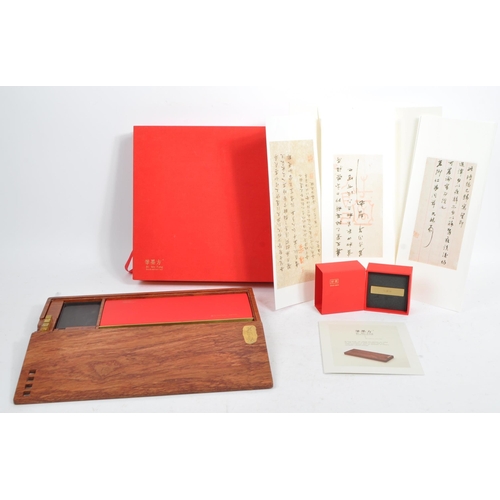 530 - A contemporary Chinese / Oriental brush and ink case writing set by Bi Mo Fang. Contains a brush for... 