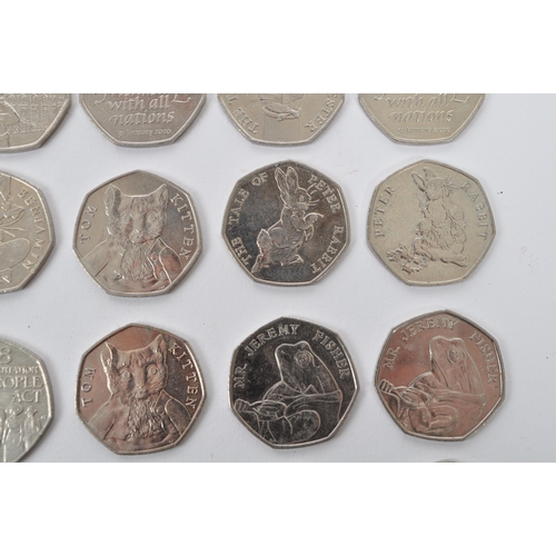 544 - A collection of GB £0.50p pieces to include: 2018 Paddington Bear, 2019 Paddington Bear, 2017 The Ta... 