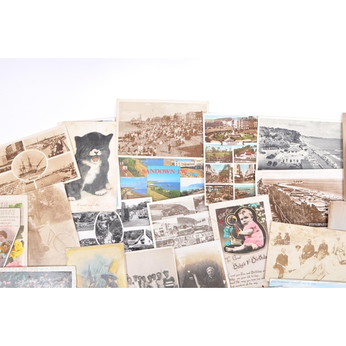 547 - A collection of early to mid 20th century greetings postcards. Comprising of humorous examples, fore... 