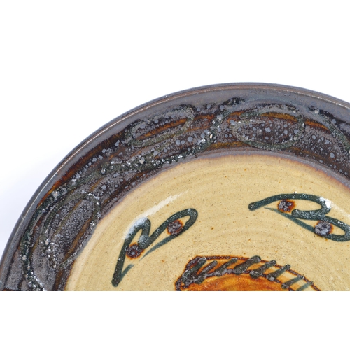 60a - Michael Leach - A vintage mid 20th century large Michael Leach studio pottery stoneware plate charge... 