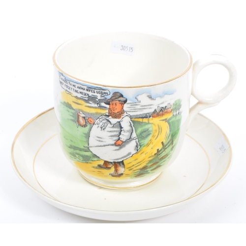 66 - A large early 1900's Victorian Tykes Motto Teacup and Saucer, inscribed for Tykes' Motto which reads... 