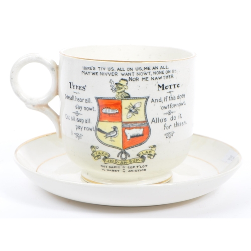 66 - A large early 1900's Victorian Tykes Motto Teacup and Saucer, inscribed for Tykes' Motto which reads... 