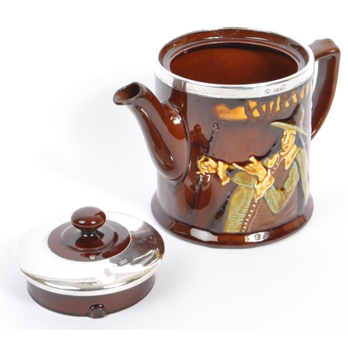 67 - Royal Doulton - An early 20th century circa 1920s Royal Doulton pied piper pattern part tea service.... 