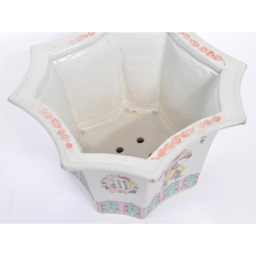 69 - A 1930s Chinese Oriental wooden bowl / planter having an hexagonal mouth rim over a hand painted bod... 