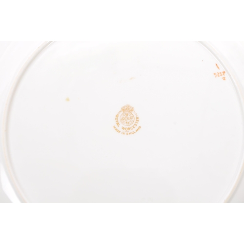 76 - A mid 20th century 1953 Royal Worcester commemorative The Ashes wall plate. The plate having white g... 