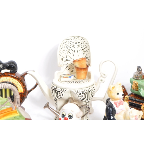 80 - A collection of eight vintage later 20th century novelty teapots. Comprising of a various examples; ... 
