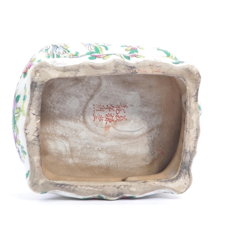 80a - A vintage 20th century ceramic famille rose plant / vase stand. Of rectangular form with hand painte... 