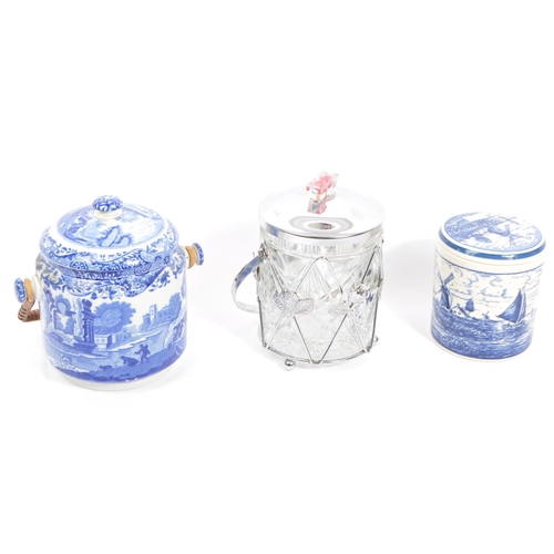 81 - Three mid century biscuit barrels and a lidded sugar pot. Comprising of a Copeland Spodes, England I... 