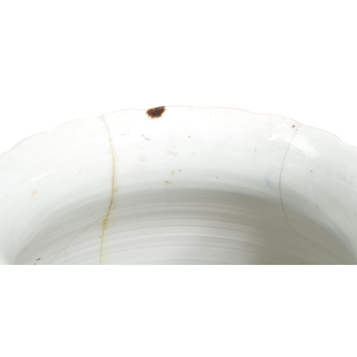 89 - A pair of late 19th century Japanese Imari urn vases. The vases featuring blue and red floral motifs... 