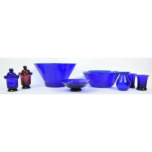 9 - A collection of mid century and later glass to include: a large, possibly Bristol Blue, bowl with fr... 