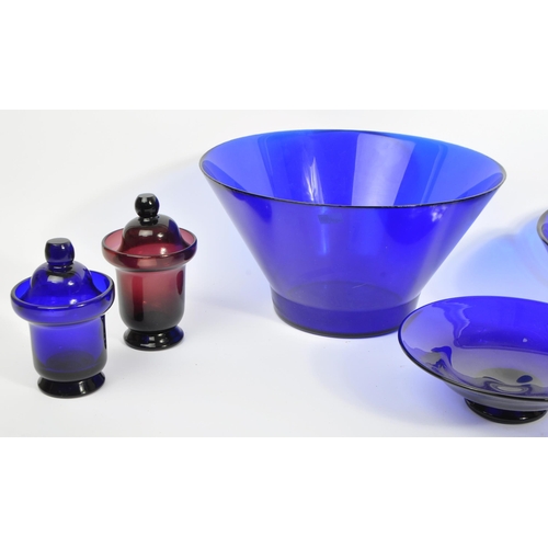 9 - A collection of mid century and later glass to include: a large, possibly Bristol Blue, bowl with fr... 