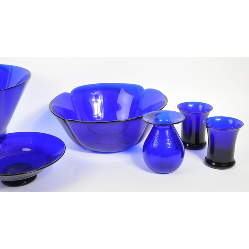 9 - A collection of mid century and later glass to include: a large, possibly Bristol Blue, bowl with fr... 