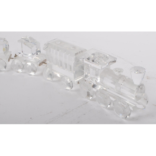 195 - Swarovski - A 20th century Swarovski five piece crystal train from the When We Were Young Collection... 