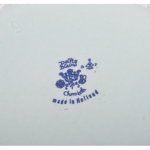 93 - Three early 20th century continental delftware blue & white chargers, to include one featuring a you... 