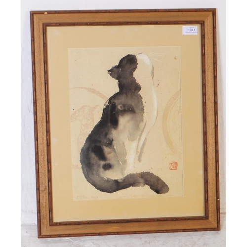 1041 - D. Chien - A 20th century Chinese print to depict a ink painting by D. Chien depicting a cat looking... 