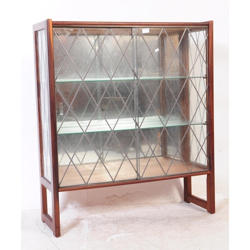 1052 - A vintage 20th century glazed display cabinet / bookcase. Rectangular form with lead sectional glaze... 